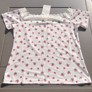 White flowered top
